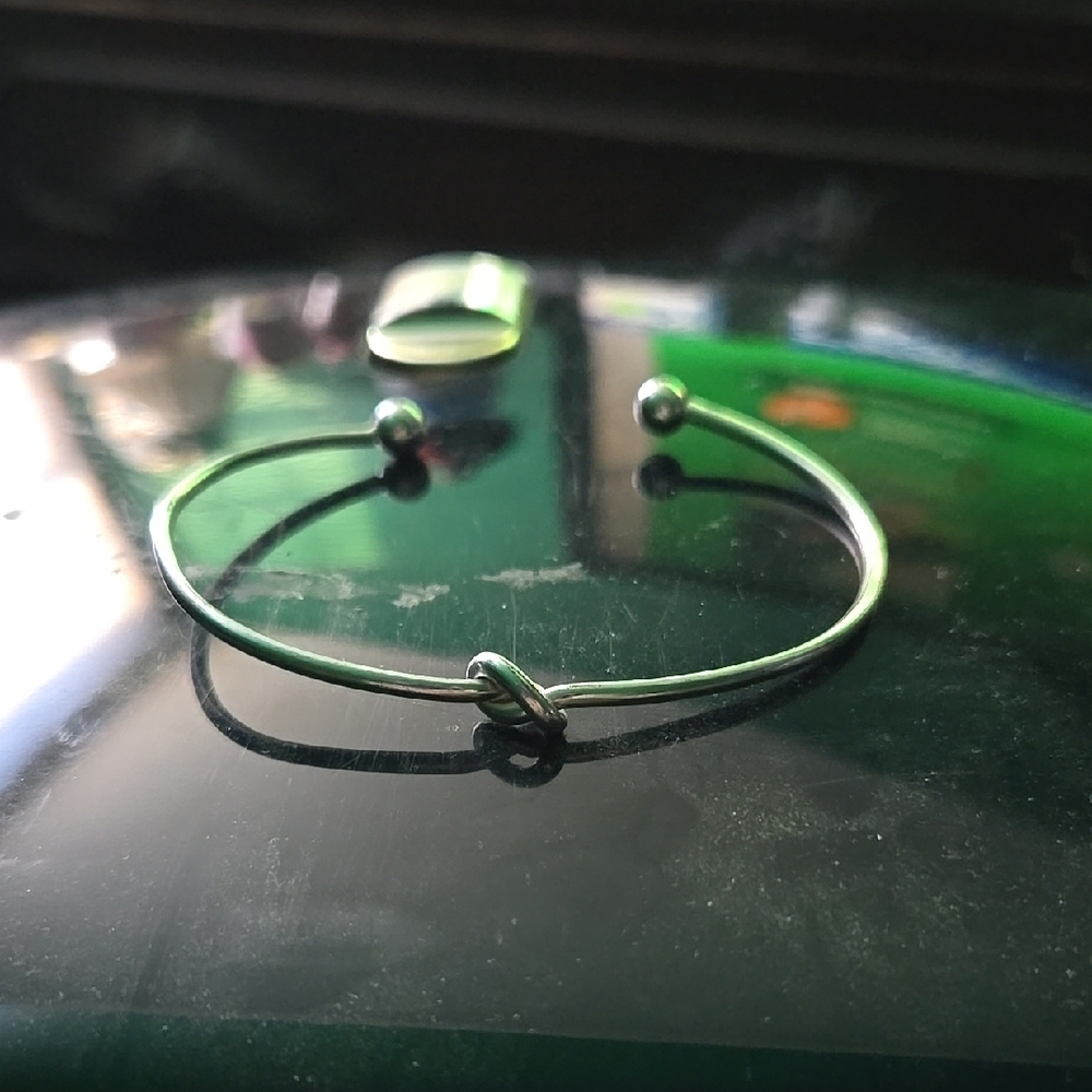 Elegant Silver Knot Bangle Bracelet